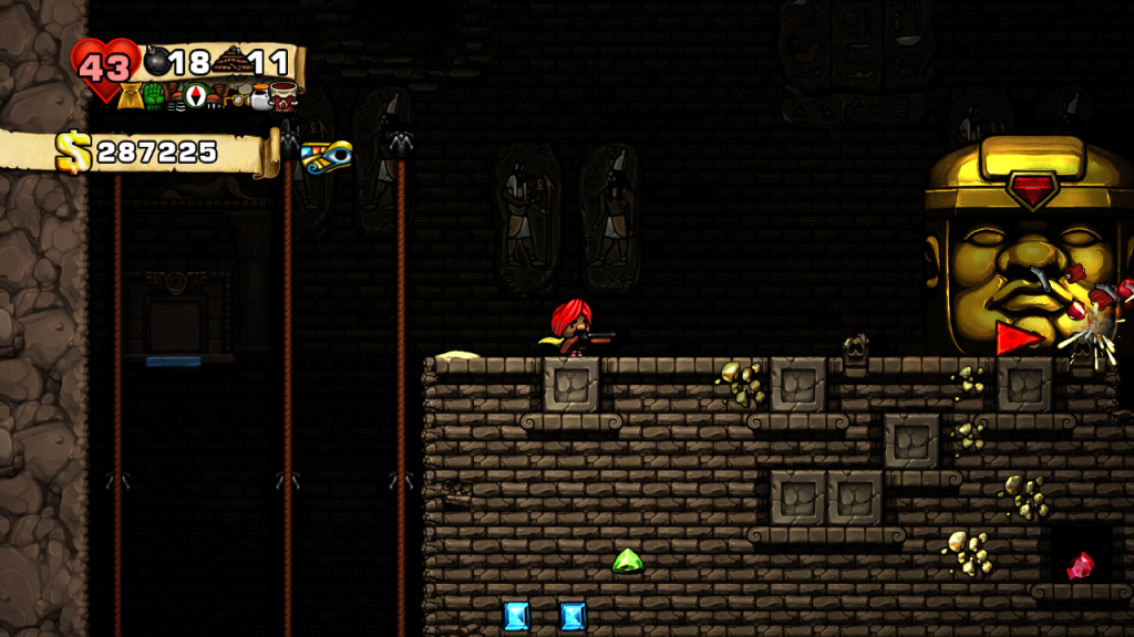 Fighting Olmec in Spelunky